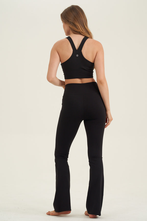 X BY GOTTEX FLARE LEG LEGGING IN BLACK