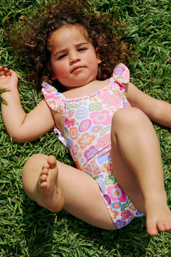 GIRLS SWIMSUIT WITH RUFFLED STRAPS AND FLOWER PRINT