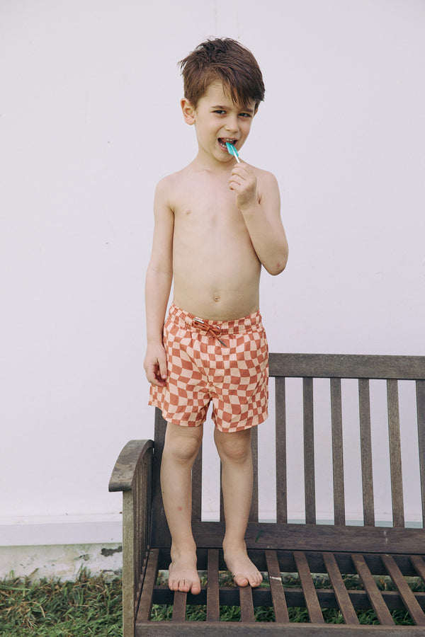 KIDS SWIM SHORTS IN MULTI ORANGE