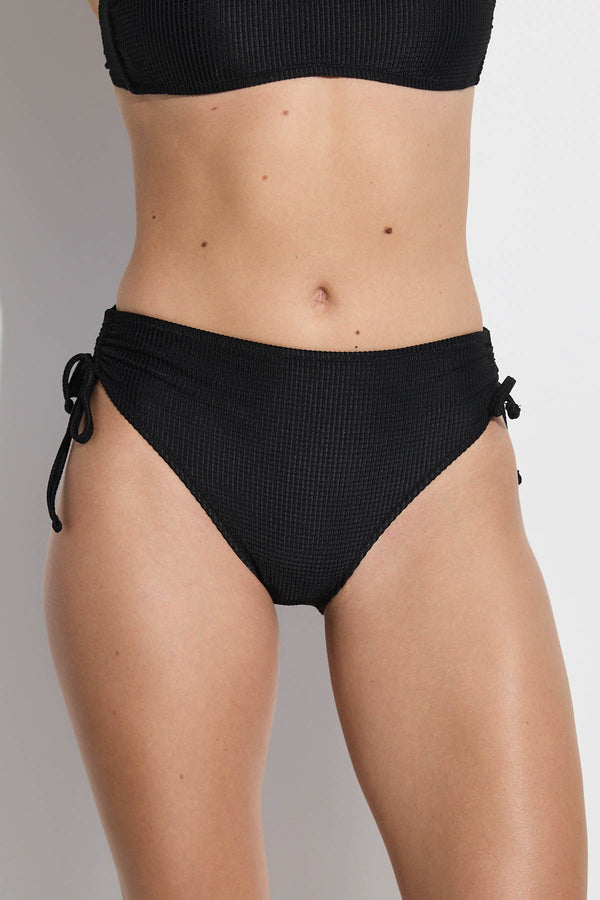 GOTTEX SIMPLY WAFFLE TEXTURED HIGH WAIST BIKINI BOTTOM WITH STRING TIES IN BLACK