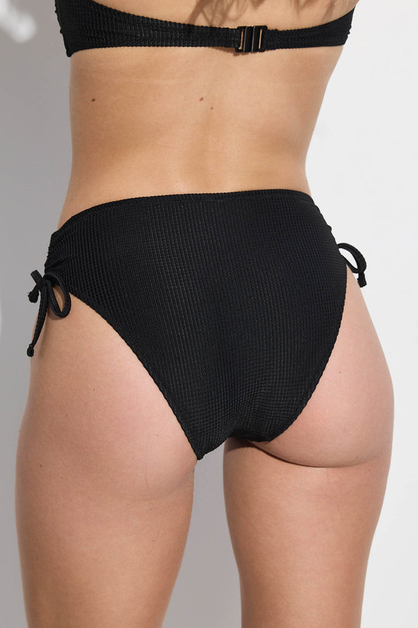 GOTTEX SIMPLY WAFFLE TEXTURED HIGH WAIST BIKINI BOTTOM WITH STRING TIES IN BLACK